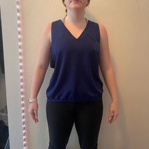 Express cutout side sleeveless blouse